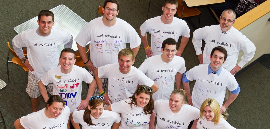 Group of people posing for a picture