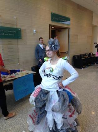 Woman dressed in recyclable clothing